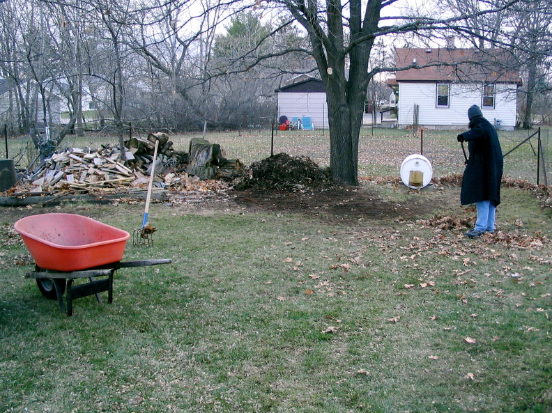 Dale raking the yard on the weekend before Trivia