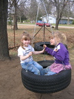 Sam and Lonnie enjoying the tire swing.