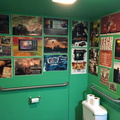 Poster collection in the Men's Room at the Tech Lounge